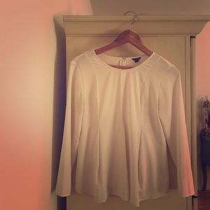 White blouse, flair at bottom